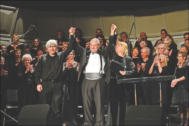 Mark Kolt (left), Flin Flon Community Choir musical director, and Crystal Kolt, artistic director and choir conductor, celebrated a successful 20th anniversary concert on Sunday with Jonathan Griffiths (centre), a visiting conductor from New York City who led the choristers’ performance of “Lux Aeterna.”