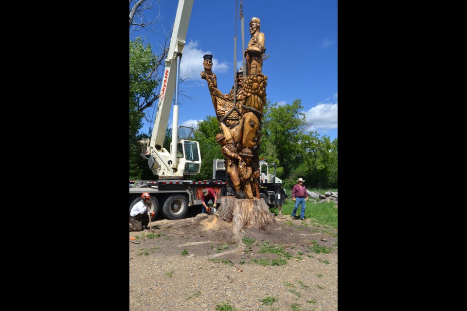 Cutline: Southeast Tree Care and Skylift Services volunteered their time to cut the tree into which the Soldiers’ Tree monument was carved, along with other volunteers not affiliated with those businesses. The monument will be transported to downtown Estevan later this summer, where it will stand near the cenotaph, in front of the Estevan courthouse.