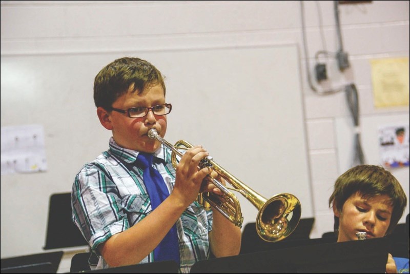 Grade 6 student Aarron McIntyre-Innerst shows his skill on the trumpet.