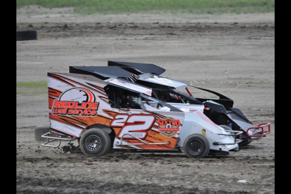 Keenan Glasser, #22, pulls up to Jesse Gibson in the slingshot race.