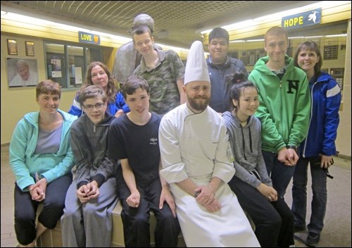 In the photo are: front row – staff member Janice Mazurek, Riley Potts, Matthew Zens, chef Jesse Bosman, Tylene Houle; back row – staff member Karen Foulston, Joshua Pogany, Bradley Osecap, Harley Melko and teacher Rhea Good