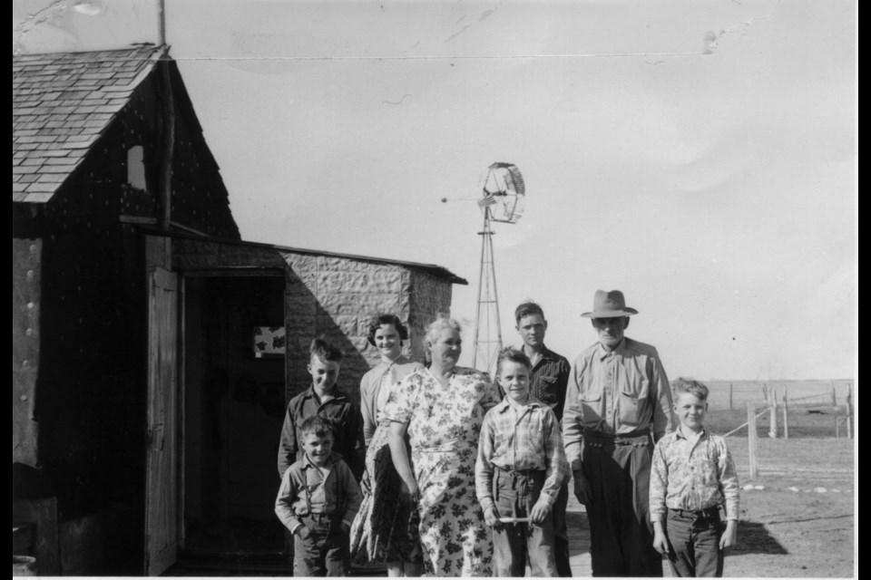 The Reinhold Mantei family with six of their 12 children. Three siblings still live in the area (Roy and Don and Lorna Fiest. Donald (back left) still lives on the farm.