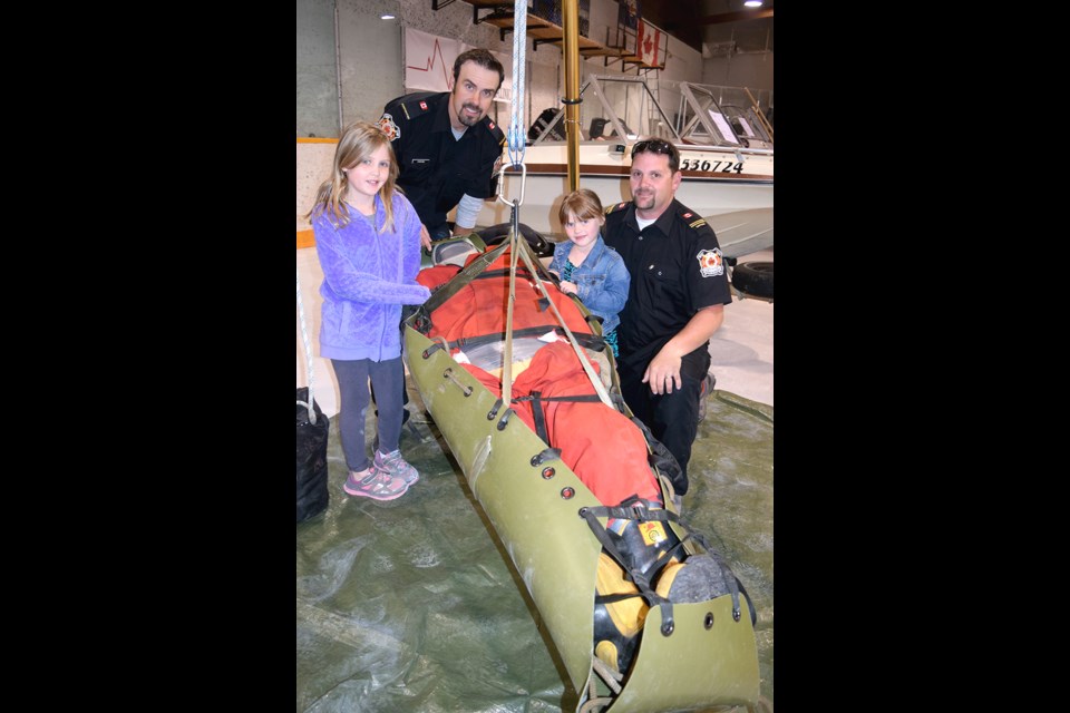 The Canora fire department displayed its tripod used in a confined space rescue situation. From left were: Jordan Harper, Brad Sherard, Jess Harper and Ryea Harper.