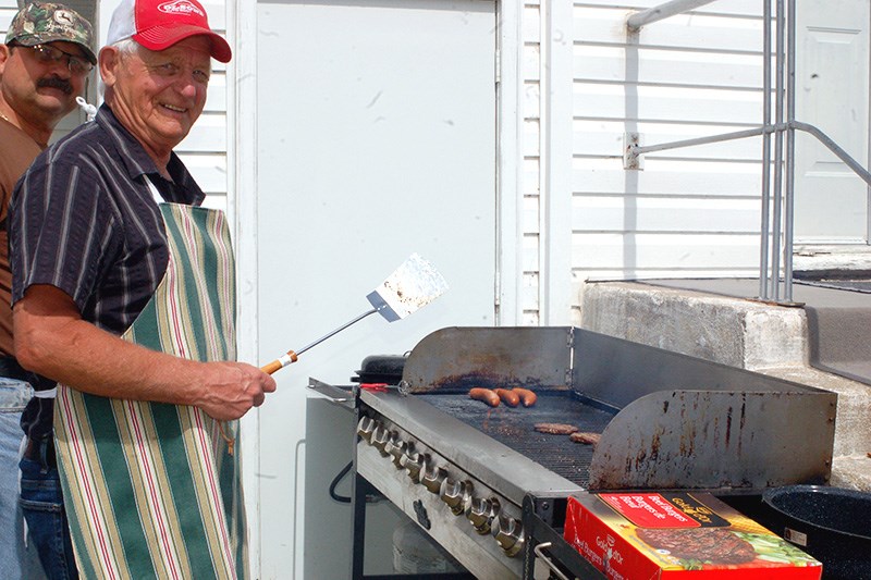 Larry Skogen was the main chef for the day at the Grace United Church in Sturgis celebration.