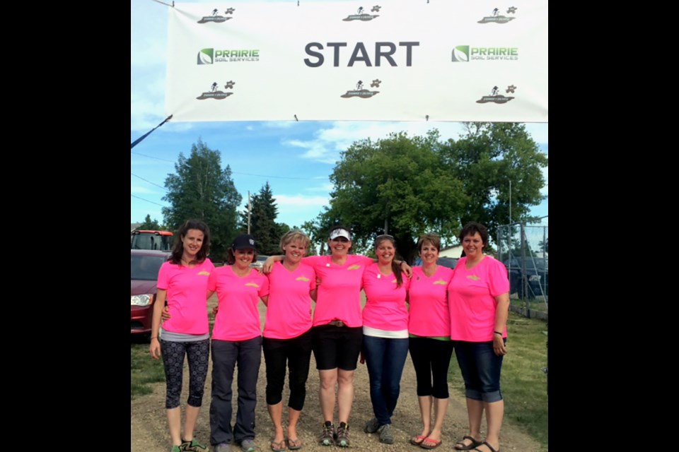 The organizers of the Farmer’s Filthy 5 in Stenen posed for a photo at the starting line. From left, was: Jaime Johnson, Chelsie Will, Stacy Rubletz, Nicole Korpusik, Emma Owen, Reagan Foster, and Trudy Scebenski.