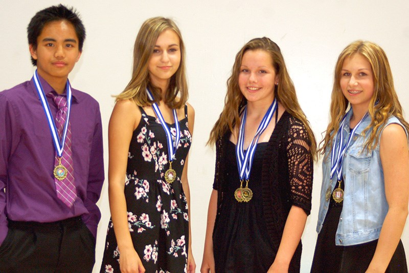 Awards for Preeceville School students for Grade 8 were presented, from left, to: Willen Paligan, Emily Prestie, Morgan McLean and Olivia Chornomitz.