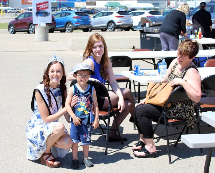 Mingling at the Hyundai barbecue for Yorkton Transitional Homes for Youth June 23.