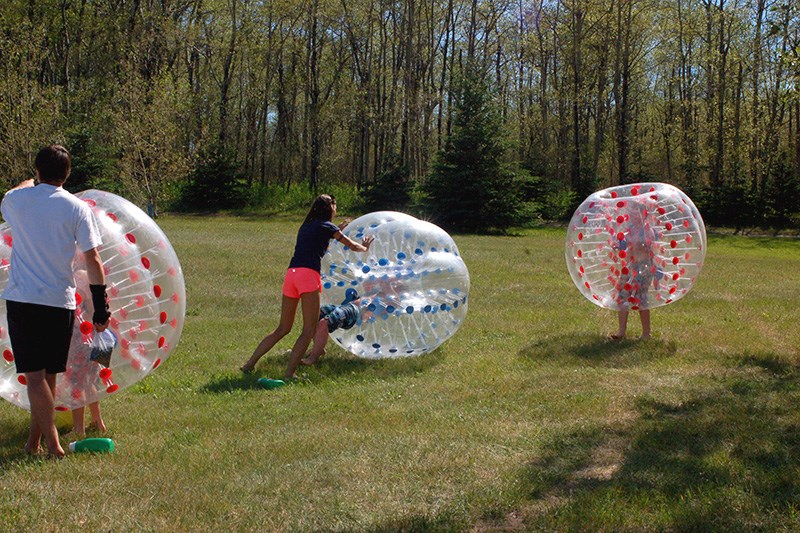 Mason Bilan and Luke Sandager had fun playing in the giant inflatable bubbles.