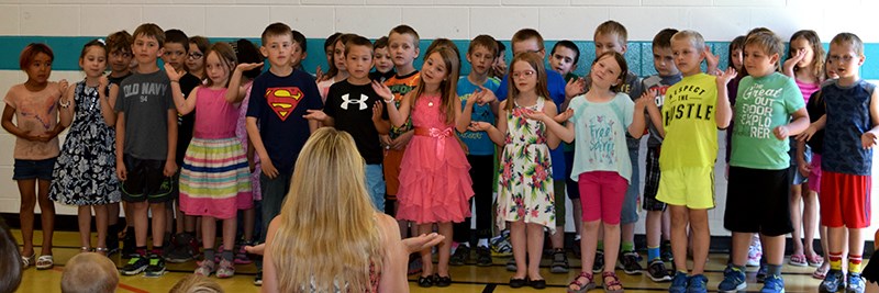 Grade One students performed the song A B C You Later to say goodbye to the school year and to retiring teachers.