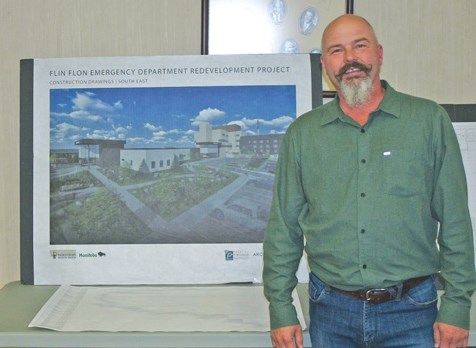 Sean Fehr of Fresh Projects Builders with an artist’s conception of the new Flin Flon ER.