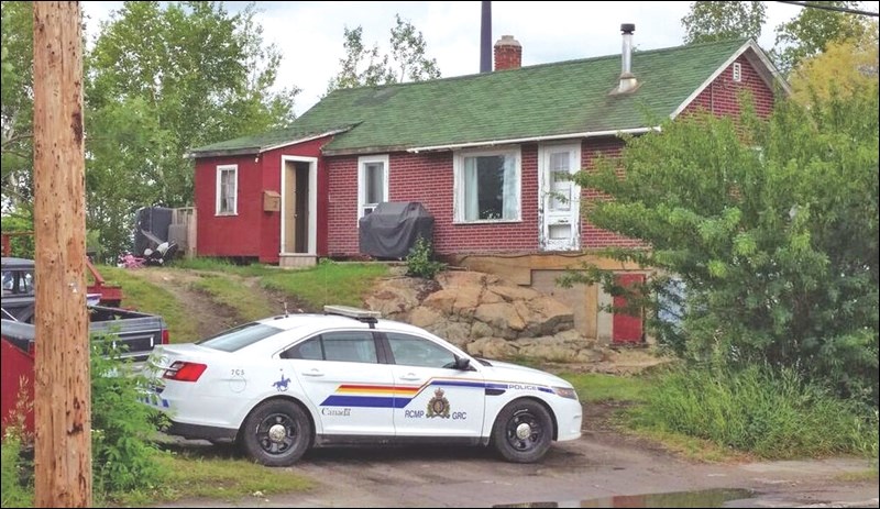 An RCMP cruiser outside 2 Hudson Street on Monday morning, about 30 minutes after a standoff with a man inside ended.