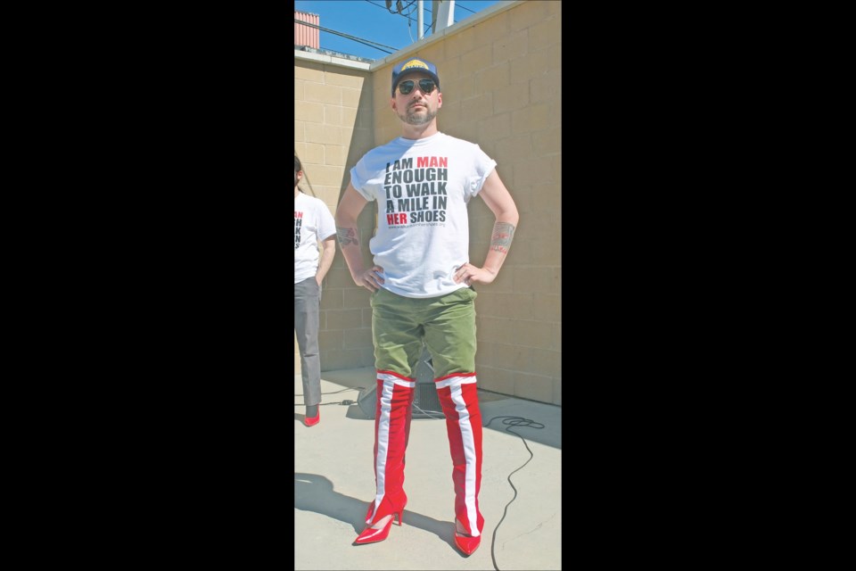 CC Trubiak wore Wonder Woman boots over his high heels.