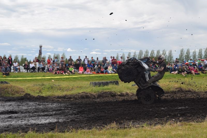 A highlight of the Canada Day celebration at Kamsack was the Kamsack Mud Slingers’ annual Mud Bog event which attracted nearly twice as many competitors as last year and attracted about 600 spectators. Among the competitors racing through the mud course was Darryl Sterzer of Kamsack.