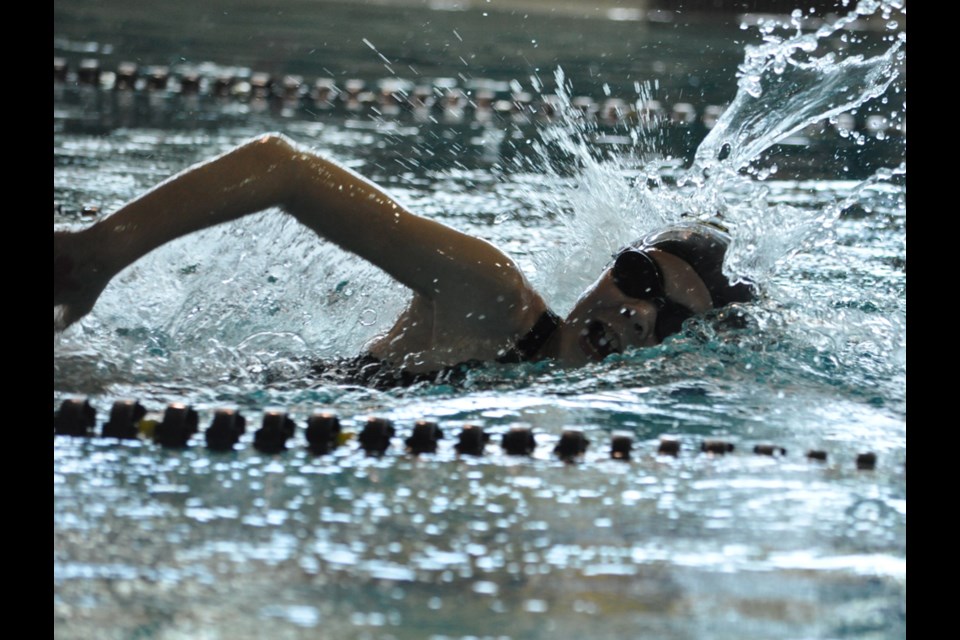 Emily Tarnes gives her all in the girls ages 9-10 50m freestyle race.