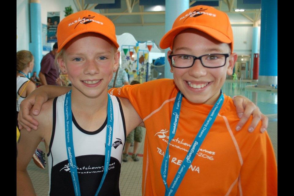 Molly Lakustiuk and Jonathon Warawa, two gold medallists for Regina in the girls and boys triathlon on Monday at the Saskatchewan Summer Games.
