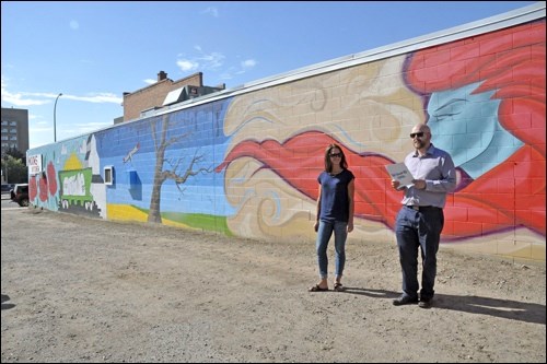 Lisa Kissick, executive director of the North Battleford Business Improvement District and Devin MacAuley of the City of North Battleford at the unveiling of the Art Alley project. Photos by Shannon Kovalsky
