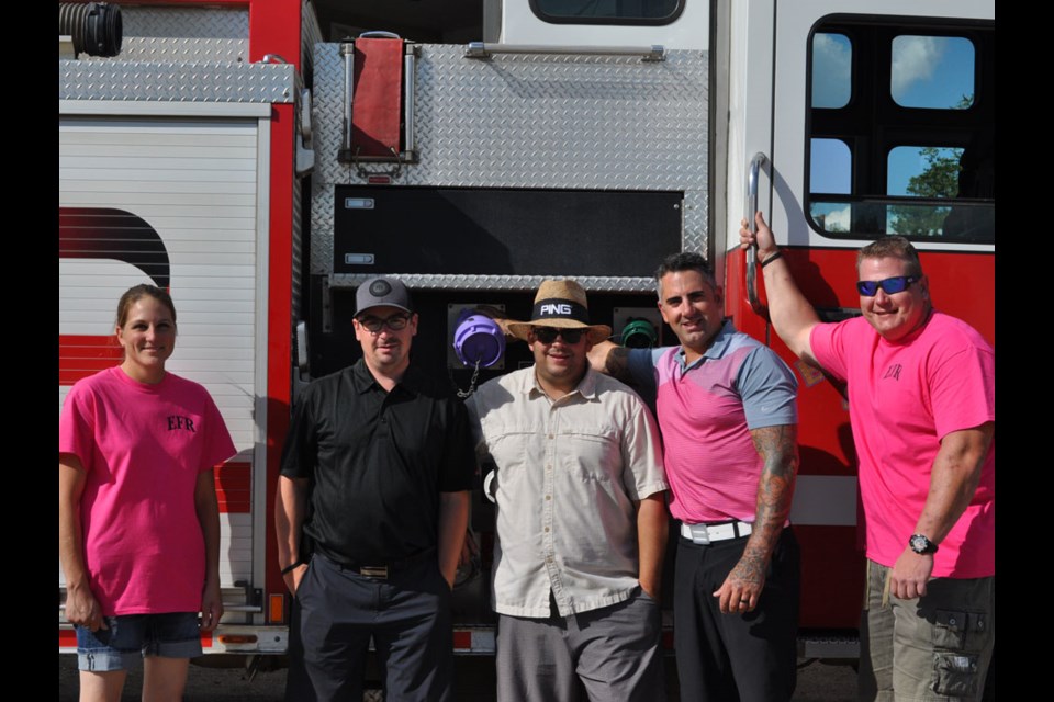 Estevan Fire Rescue members and supporters, from left, Mallory Cappelle, Kyle Luc, Kurt Schmidt, Nick Tritees and Dale Feser welcomed golfers to TS&M Woodlawn Golf Club on Saturday for the second annual Neil Kish Memorial.