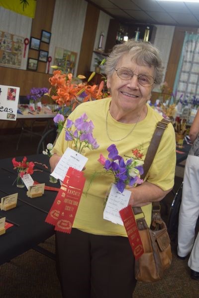 For a third consecutive year, Vicky Koreluik was named the grand aggregate winner of the Kamsack and District Horticulture Society’s annual show held Friday. She was photographed with displays of sweet peas for which she received first-place ribbons.