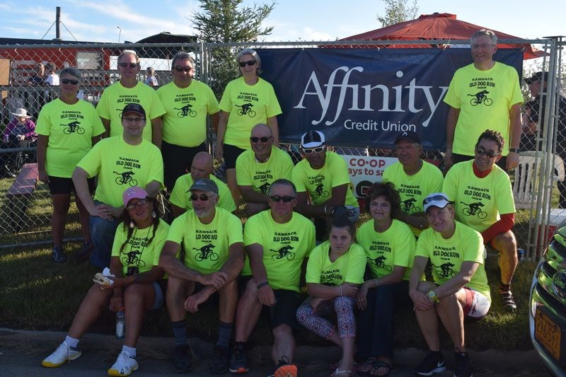 The 14 cyclists with the 10th annual Old Dog Run and a few of the support staff that accompanied them were photographed upon their return to Kamsack around 6 p.m. on August 6. From left, they are: (back row) Brenda Andrews of Cote Siding, Terry Ross of Yorkton, Harold Maksymetz of Kamsack, Anne Stupak of Yorkton and Rob Hardwick of Regina; (middle) Stephen Kozakewich of Yorkton, Ric Janzen of Glenside, Warren Popick of Yorkton, Phil Eruera of North Vancouver, Joe Kozakewich of Kamsack, Ken Achtymichuk of Outlook, and (front) Mary-Ann Ketchemonia of Keeseekoose First Nation, Warren Summers of Cote Siding, Greg Nichol of Kamsack, Bailey MacDonald of Yorkton, Debbie Kozakewich of Kamsack and Mary Konkin of North Vancouver.