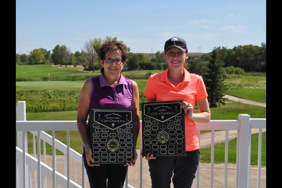 TS&M Woodlawn Golf Club senior ladies winner Bernadette Wright, left, and ladies winner Meghan Betnar show off their club championship plaques.