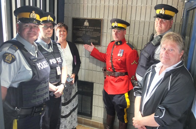 Manitoba RCMP Staff Sgt. Maj. Wayne Foster (centre) displays the plaque at the Flin Flon detachment. Pictured (from left) are Staff Sgt. Brian Udey of Pelican Narrows, Sgt. Mark Svaren of Flin Flon, Leslie Beck of the RCMP Veterans’ Association, Foster, Sgt. Sean McPhee of Creighton and Flin Flon mayor Cal Huntley.