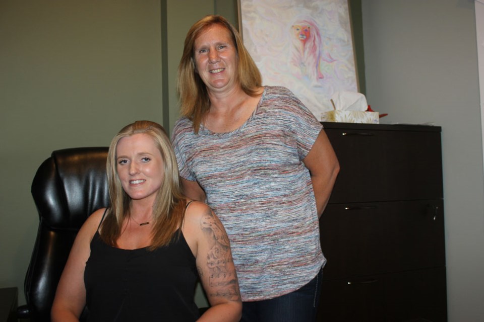 鶹Ƶeast Regional Victim Services assistant co-ordinator Terri Campbell (seated) with volunteer Roberta DeRosier. Victim Services plays a key role in helping people during their time of need.