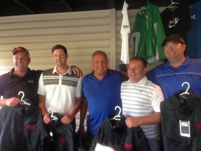 The team, from left, was comprise of Darryl Williams of Saskatoon, Mitch Samuels of Warman, Terry Dennis (presenter), Brad Tkachuk of Warman, and Ross Samuels of Warman.