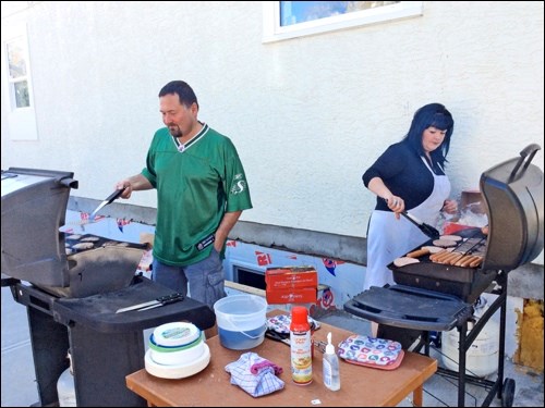 Hot dogs and hamburgers were cooked up and provided free of charge for those in attendance, many of whom brought their lawn chairs to enjoy the entertainment.