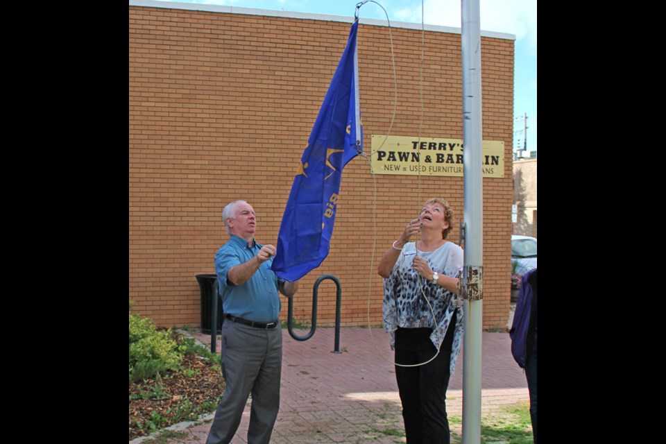 Big Brothers Big Sisters (BBBS) Yorkton president Susan Stewards and Mayor Bob Maloney raise the BBBS flag at City Hall Tuesday to mark Big Brothers Big Sisters Month in the City. “Big Brothers Big Sisters has formalized the mentor process offering the best possible services by providing mentors for children and youth who need a significant, caring adult in their lives. Big Brothers Big Sisters is proven to improve children’s odds for succeeding in school, behaving non-violently, increased self-esteem/self-worth, healthier lifestyles, evidence of higher incomes, avoiding drugs and alcohol and breaking negative cycles,” said Irma Van De Bon-Nicol, BBBS executive director.