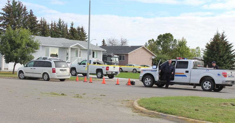 Wellington Park Road was cordoned off Tuesday morning while police investigated the death of an adult male found in the street there.