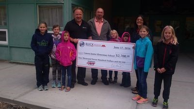 At the cheque presentation, from left, were: Jessee Kopelchuk, Makayla Heshka, Olivia Tratch, Cal Homeniuk (Key Chevrolet sales manager), Rod Steciuk (principal), Addison Dutchak, Mickayla Maygard, Vanessa Gurski-Fediuk (Key Chevrolet associate), Sophia Tratch and Alaina Roebuck.