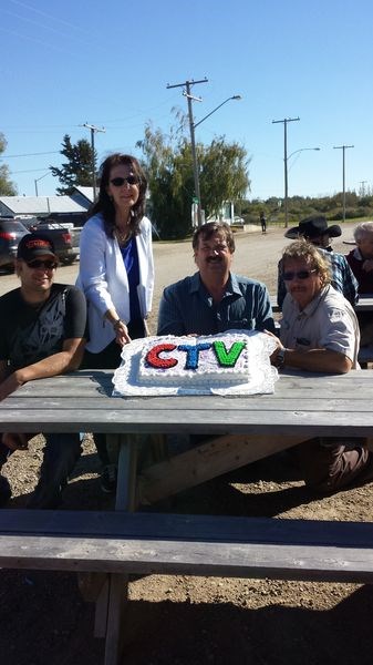 Photographed with the cake shared with CTV Regina as acknowledgement for featuring Rama in the Hometown Tour were, from left, Evan Matsalla, Mary Kowalyshen, Darrell Dutchak (mayor) and Phillip Shewchuk.