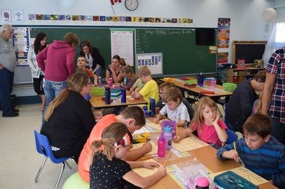 Families participated in the creation of a family shield, which displayed their last names and images that represented their families, as a craft. A hot dog lunch was served by the Canora-Pelly MLA office of Terry Dennis.