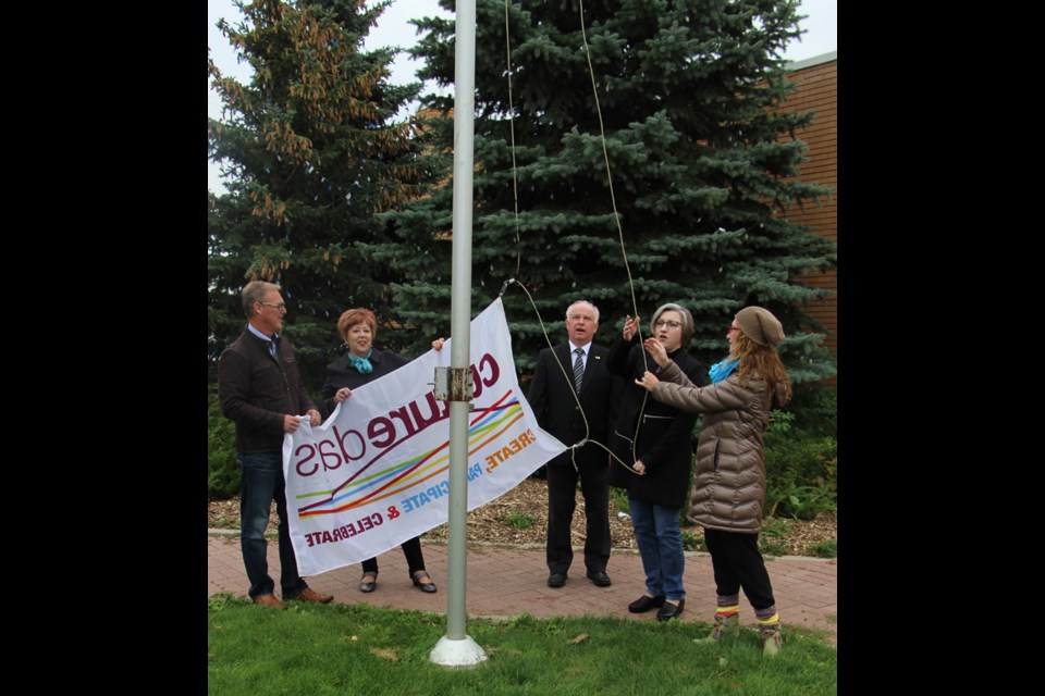 Culture Days - The flag is raised to celebrate Culture Days, a Canada-wide event that runs September 30 and October 1-2. In Yorkton, that means events at the Yorkton Public Library and the Yorkton Regional High School. The event at the school will feature workshops, monologue presentations, film screenings throughout the day by the Yorkton Film Festival and a concert by the Andino Suns. The day will be full of events between 1:00 p.m. and 5:00 p.m. Pictured are James Wilson and Randy Goulden with city council, Bob Maloney, mayor, Tonia Vermette with the Yorkton Arts Council and Carrie Pengilly, artistic director of Free My Muse Theatre.
