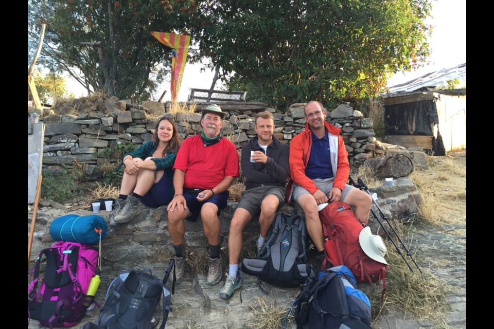 Rev. Stewart Miller (second from left), pictured with friends Sandra Feja (left), Dominik Formanowicz and Kay Shroer, recently completed the famed Camino de Santiago pilgrimage voyage in Spain. It was Miller’s second journey through the Camino. Photo submitted.