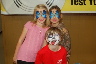 Children who enjoyed getting their faces painted, included from left: Graison Belesky, Maggie Bartel and Anebeth Bartel.