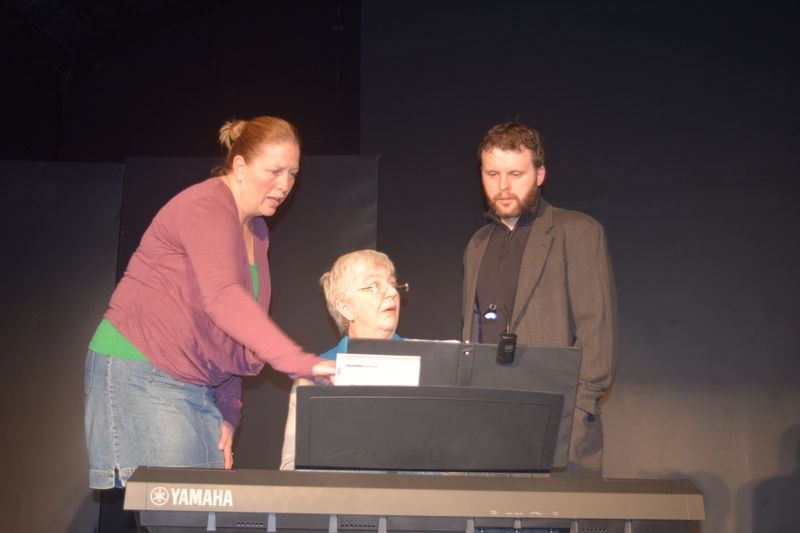 During a recent rehearsal of Dad’s Piano, the one-act play being staged by the Kamsack Players Drama Club on November 5, Leanne Keys, left, the director, discusses elements of the music that is being played by Marilyn Marsh. Seasoned actor Adrian Hovrsiko portrays all 10 characters in the play.