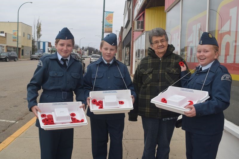 On Saturday, cadets with the Kamsack air cadet squadron will be canvassing the community in their annual pre-Remembrance Day poppy campaign. Helping to publicize the campaign recently, from left, were: Cpl. Megan Raffard, AC Tristen Chernoff, Helen Polzen and AC Tara Taylor.