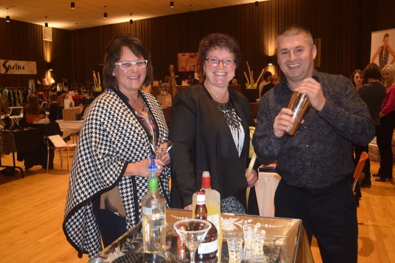 As one of the most popular guys at Girls Night Out in Kamsack on October 22, Kevin Ludba of Canora made lemon drop cocktails for the women, including Trudi Binkley, left, and Connie Barrowman.