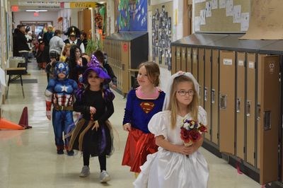 Canora Composite School held a dance, costume parade, and a pumpkin carving contest, while Canora Junior Elementary School students also participated in a parade to show off their costumes. Participating in the CJES parade, from front, were Rori Love, Jordyn Ingram and Jaylene Kaytor.