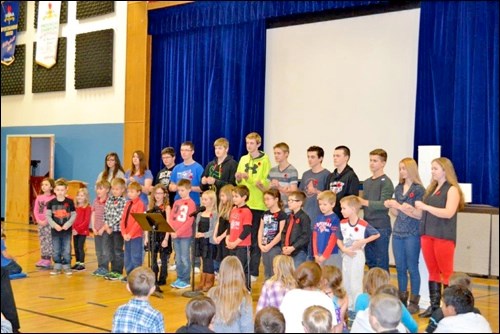 Grade 2 sang and Grade 10 signed A Song of Peace at the HHS Remembrance Day service Nov. 10.