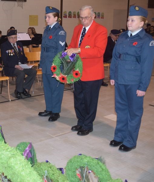 Merv Polzen laid a wreath on behalf of the third and fourth degree Knights of Columbus.
