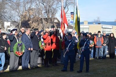 From left, the cadets carrying the flags to lead the Colour Party for the Remembrance Day service were Joanne Babb and Gracie Paul.