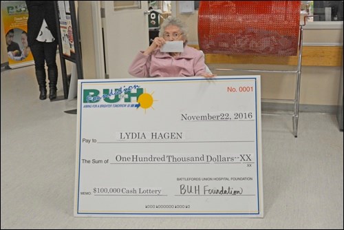 Lydia Hagen of Spiritwood kisses the cheque she received as winner of the Battleford Union Hospital Foundation’s Cash Lottery.