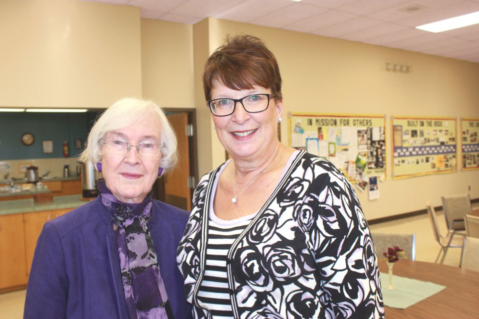 Marguerite Gallaway, left, with Estevan Arts Council board chair Wilma Mantei during a celebration on Sunday afternoon for Gallaway’s many years of service with the arts council.