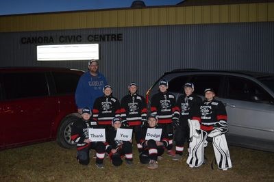 The Canora Novice Black Cobras who took part in a photo contest to earn funding from the Dodge Caravan Kids scholarship, from left, were: (back row) Trent Wolkowski (coach), Chase Hembling, Miah Ruf, Linden Roebuck, Cody Vangen and Katherine Hauber and (front) Logan Sznerch, Kayden Harder and Tucker Mydonick. Unavailable for the photo were Cooper Kraynick, Wyatt Wolkowski and Jeff Sznerch (coach).