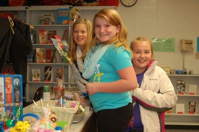 Preeceville School students who attended the book fair held at the Preeceville School's library from November 21 to November 23, from left, were: Payton Sorgen, Abigail Snider and Shayla Roelens.