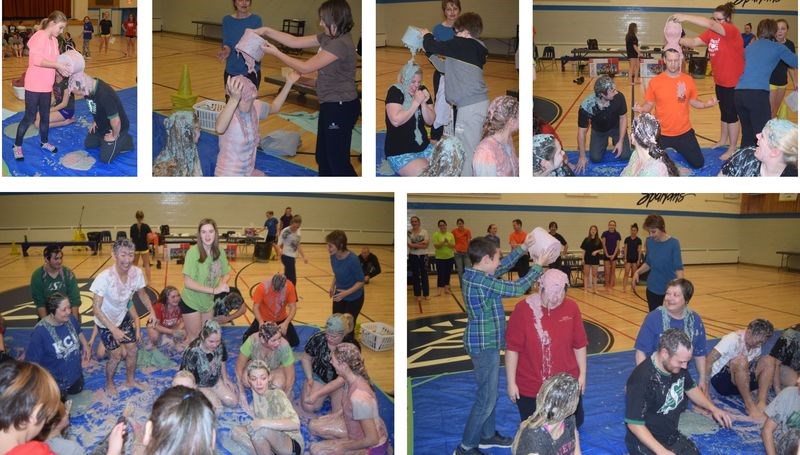 Buckets of pink and blue goop were poured by student magazine sellers onto the heads of other students and staff of the KCI last week as a finale to the school’s annual magazine subscription sale fundraiser. From left, are: (top row) Sienna Koroluk gooping Tylor Lorenzo; Riley Zbeetnoff pouring goop onto Allison Thomsen; Zack Burback gooping Brittany Brade; Laurissa Fedorchuk pouring goop on a brave Ryan Gareau, and (bottom) students and staff decorated with goop, and Sammy Smith pouring goop on Michelle Guillet.