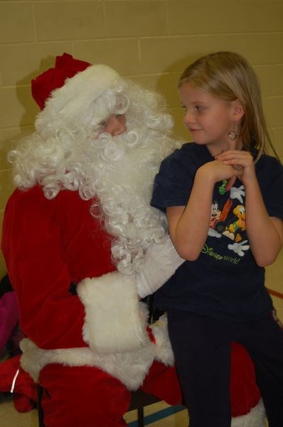 Layla Jaeb was the first in line to tell Santa Claus what she would like for Christmas during the Sturgis Kinsmen Santa Day on December 3.