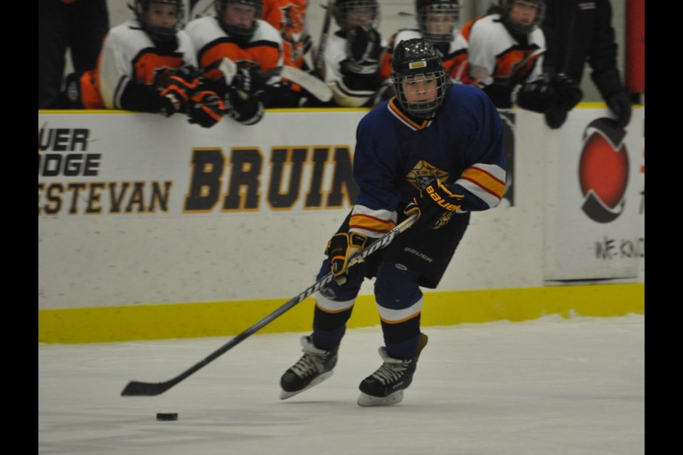 Knights centre Tayce Miller moves the puck up ice during the Estevan bantam tourney final.
